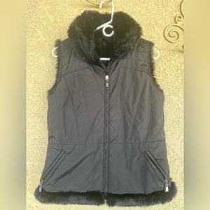 Reversible to furry woman’s vest size m